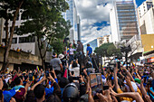 The leader of the opposition Maria Corina Machado, appears at the rally of the opposition called by her, in the streets of Caracas.