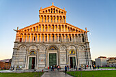 The west facade of the Pisa Duomo or Primatial Metropolitan Cathedral of the Assumption of Mary in Pisa, Italy.