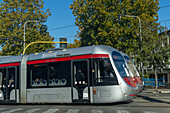 A modern electric tram is economical transportation in Florence, Italy.