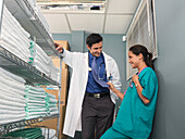 Doctor and Nurse Flirting in Supply Room