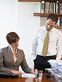 Man and Woman in Office