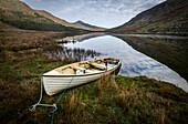 Boat moored on lakeside, The Black Valley, County Kerry, Munster, Republic of Ireland