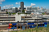 Sheffield Railway station seen from the east with Supertram stop in foreground and city centre behind, Granville Street, Sheffield, Yorkshire, England