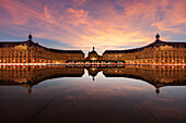 Place de la Bourse reflected in the Water Mirror at sunset, Bordeaux, Nouvelle Aquitaine, France, Europe