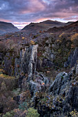 Glyn Rhonwy Disused Slate Quarry backed by the Llanberis Pass and Yr Wyddfa (Mount Snowdon) in autumn, near Llanberis, Snowdonia National Park (Eryri), North Wales, United Kingdom, Europe