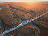 An aerial view of the Song Kol lake area at sunrise, Kyrgyzstan