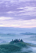 Misty sunrise over Belvedere, Val d'Orcia, UNESCO, Tuscany, Italy