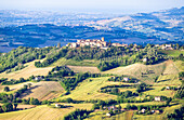 View towards hilltop village of Monteleone di Fermo and the surrounding countryside, Marche, Italy