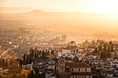 Atmospheric hazy sunset over Albaicin, UNESCO, Granada, Andalucia, Spain