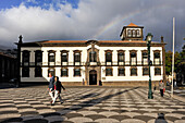 Stormy sky and rainbow above the City Hall Square, Funchal, Madeira island, Atlantic Ocean, Portugal