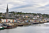 St. Colman's Cathedral overlooking the Waterfront at Cobh, Cork Harbour, County Cork, Munster, Republic of Ireland