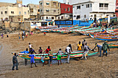 Fishing dugout boats on beach, Ngor village, Pointe des Almadies, Dakar, Senegal, West Africa