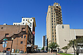 Jefferson Theatre with San Jacinto Building in the background, Fannin Street in downtown Beaumont, Texas, United States of America