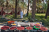 Dates displayed for sale on the roadside near Nakhal,, Sultanate of Oman, Arabian Peninsula