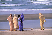 Women dressed in saris on the beach of Barka, Sultanate of Oman, Arabian Peninsula