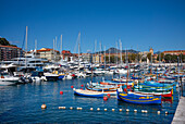 Traditional colourful fishing boats moored in Port de Nice, UNESCO, Alpes Maritimes, French Riviera, Provence, France