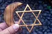 Islam and Judaism concept of interfaith dialogue, Jewish Star of David and Muslim Crescent, Indonesia