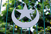 Star and crescent, symbol of Islam on a Mosque railing, Ho Chi Minh City, Vietnam