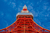 View of Tokyo Tower from its base against blue sky, Shibakoen, Minato City, Tokyo, Honshu, Japan