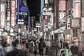 View of busy street and neon lights at night in Shibuya District, Kamiyamacho, Shibuya City, Tokyo, Honshu, Japan