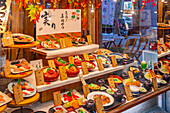 View of traditional Japanese dishes on display in shop window, Asakusa, Taito City, Tokyo, Honshu, Japan