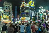 View of Kabukicho neon lit street and crossings at night, Shinjuku City, Kabukicho, Tokyo, Honshu, Japan