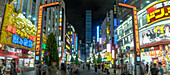 View of Kabukicho neon lit street and crossings at night, Shinjuku City, Kabukicho, Tokyo, Honshu, Japan