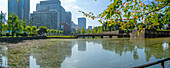 View of reflections in Wadakura Moat on a sunny day, Chiyoda, Tokyo, Honshu, Japan