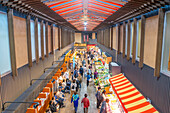 Elevated view of stalls and people in Omicho Market, Kanazawa City, Ishikawa Prefecture, Honshu, Japan