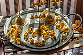 View of gold jewellery on display in shop window in the Higashi Chaya District, Kanazawa City, Ishikawa Prefecture, Honshu, Japan