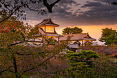 View of Nezumita-mon Gate, entrance to Kanazawa Castle and Park at sunset, Kanazawa City, Ishikawa Prefecture, Honshu, Japan