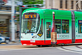 City tram on major street during daytime, Hondori, Naka Ward, Hiroshima, Honshu, Japan