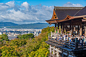 View of The Stage of Kiyomizu at Kiyomizu-dera Temple with city in background, Kiyomizu, Higashiyama Ward, Kyoto, Honshu, Japan