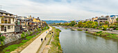 View of Kamo River during daytime in Nakagyo Ward, Nabeyacho, Kyoto, Honshu, Japan