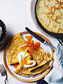 Vanilla cr�pes with verjuice caramel and whipped cream