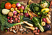 Variety of autumn vegetables on a wooden base