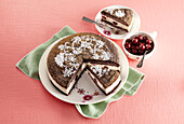 Poppy seed cake with vanilla cream and sour cherries