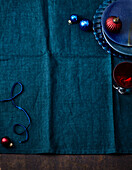 Christmas fabric background in shades of blue, Christmas tree baubles