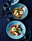 Ricotta dumplings with truffle and mushroom filling and melted sage tomatoes