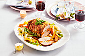 Stuffed roast pork with vegetables