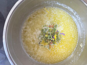 Melted butter with a mixture of herbs and flowers