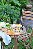Chanterelle and cauliflower quiche served in the garden