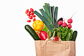 Clipping of paper carrier bag with fresh vegetables