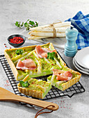 Puff pastry asparagus tart with peas and serrano
