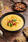 Pea soup with crispy bacon and olive oil