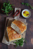 Focaccia with 24-hour proofing time served with rocket and chilli oil