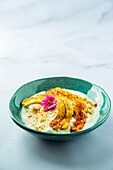 Frozen yoghurt with honey, caramel and banana