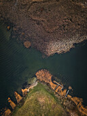Aerial view of Elektrenu marios artificial lake with tranquil water and lush green vegetation,Elektrenai,Lithuania