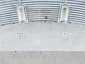 Aerial view of minimalist urban design featuring stairs and pavement with one person,Vingio park,Vilnius,Lithuania