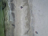 Aerial view of a beautiful beach with people enjoying the sun and waves,Bradenton Beach,United States